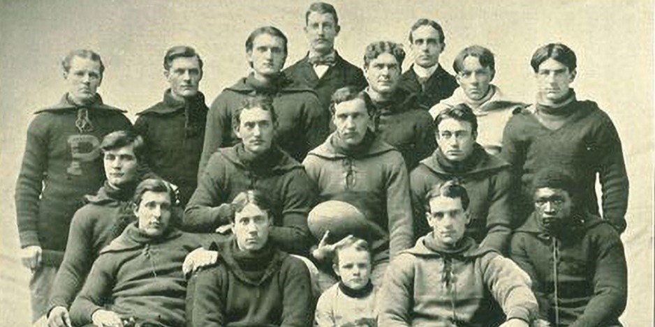 Frank 'Kinney' Holbrook (first row, far right) is the University of Iowa's first Black football student-athlete.